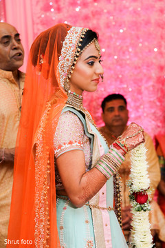 Stunning maharani with the mehndi holding the flower garland Stunning maharani with the mehndi holding the flower garland