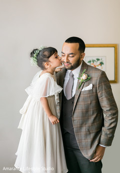 Tender moment with a little guest before the Indian wedding Tender moment with a little guest before the Indian wedding