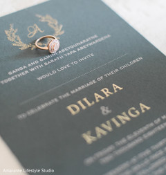 Close up of the Indian wedding invitation and ring Close up of the Indian wedding invitation and ring