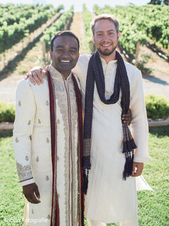 Indian groom taking a picture with a special guest Indian groom taking a picture with a special guest