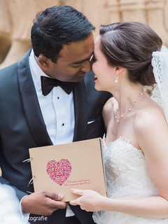 Adorable Indian bride being kissed by groom outdoor capture. Adorable Indian bride being kissed by groom outdoor capture.