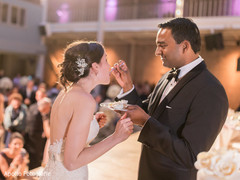 Lovely capture Indian groom giving cake to the bride. Lovely capture Indian groom giving cake to the bride.