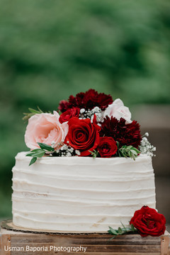 Detail of the Indian wedding cake and floral decorations Detail of the Indian wedding cake and floral decorations