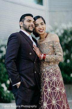 Beautiful portrait of the Indian newlyweds ready for reception