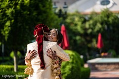 Indian bride and groom's romantic first look moment Indian bride and groom's romantic first look moment