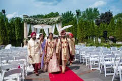 Indian bride and groom exiting the wedding Indian bride and groom exiting the wedding