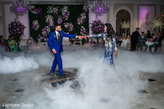 Indian newlyweds making their entrance to wedding reception Indian newlyweds making their entrance to wedding reception