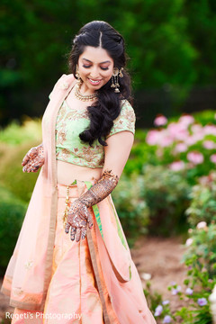 Indian bride showing her mehndi designs Indian bride showing her mehndi designs