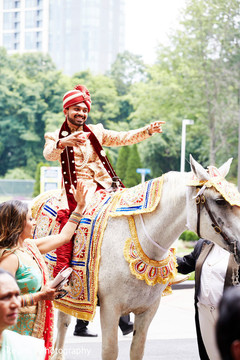 Indian groom dancing during baraat Indian groom dancing during baraat