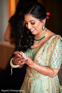 Maharani putting on her bangles Maharani putting on her bangles