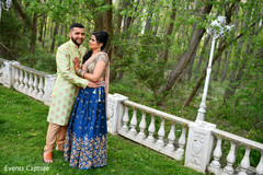 Lovely Indian couple on their sangeet outfits. Lovely Indian couple on their sangeet outfits.