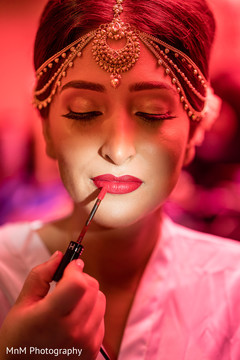 Gorgeous maharani being assisted with hair and makeup Gorgeous maharani being assisted with hair and makeup