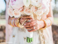 Indian bride holding her bouquet Indian bride holding her bouquet