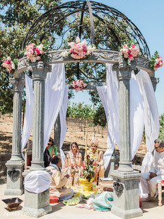 Lovely indian couple under gazebo Lovely indian couple under gazebo