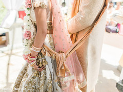 Detail of the Sari and Sherwani worn by the newlyweds Detail of the Sari and Sherwani worn by the newlyweds