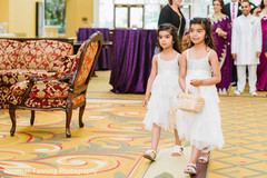 Lovely Indian wedding flower girls walking into ceremony. Lovely Indian wedding flower girls walking into ceremony.