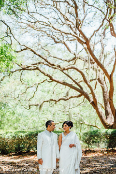 Stunning Indian bride and groom outdoors photo. Stunning Indian bride and groom outdoors photo.