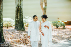 Adorable Indian couple walking outdoors. Adorable Indian couple walking outdoors.