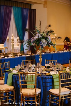Beautiful Indian wedding reception table floral centerpiece. Beautiful Indian wedding reception table floral centerpiece.