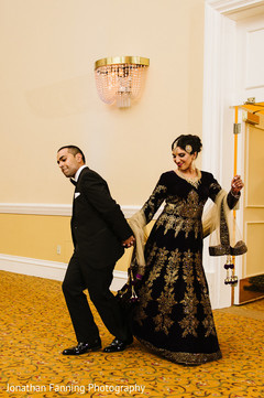 Marvelous indian love birds portrait dancing in to their wedding reception. Marvelous indian love birds portrait dancing in to their wedding reception.