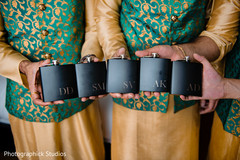 Indian groomsmen holding personalized gifts capture. Indian groomsmen holding personalized gifts capture.