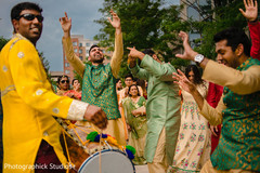 Dhol player during baraat procession. Dhol player during baraat procession.