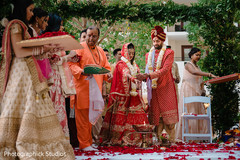 Rajaham ritual where bride and groom throw the rice on sacred fire. Rajaham ritual where bride and groom throw the rice on sacred fire.