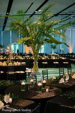 Delightful Indian wedding reception table centerpiece decor. Delightful Indian wedding reception table centerpiece decor.