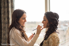 Beautiful Indian bride getting ready for wedding reception. Beautiful Indian bride getting ready for wedding reception.