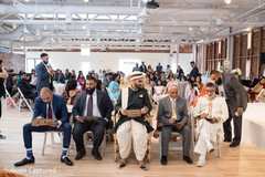 Indian groom with parents and groomsmen playing agame. Indian groom with parents and groomsmen playing agame.