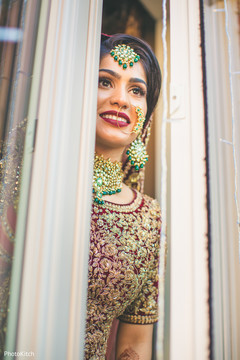 Sweet indian bride looking out the window Sweet indian bride looking out the window