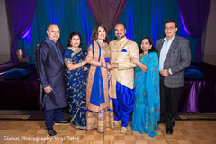 Lovely capture of the Indian couple with their families before the wedding Lovely capture of the Indian couple with their families before the wedding