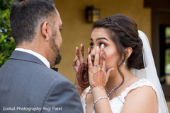 Indian bride has an emotional moment during the photo shoot Indian bride has an emotional moment during the photo shoot