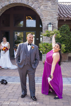 Fun capture of the Indian groom with joyful bridesmaid Fun capture of the Indian groom with joyful bridesmaid