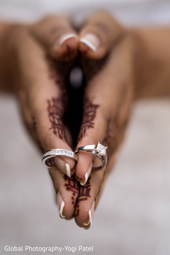 Different angle of the details of the mehndi design and rings Different angle of the details of the mehndi design and rings