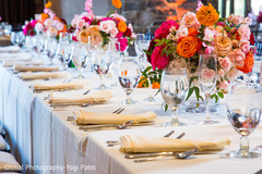 Dreamy Indian wedding reception table flowers and glassware. Dreamy Indian wedding reception table flowers and glassware.