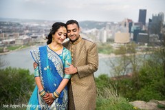 Details of the sari and sherwani worn by the Indian couple Details of the sari and sherwani worn by the Indian couple