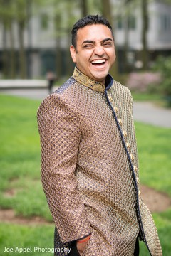 Smiling Raja posses for pictures prior to the Indian wedding Smiling Raja posses for pictures prior to the Indian wedding