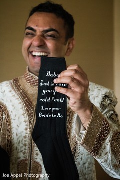 Fun capture of the Raja showing a gift from the maharani Fun capture of the Raja showing a gift from the maharani