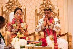 Indian bride and groom show respects during the ceremony Indian bride and groom show respects during the ceremony