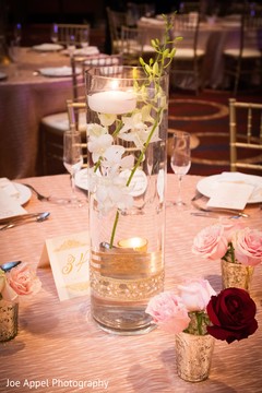 Beautiful design of the Indian wedding table center piece Beautiful design of the Indian wedding table center piece