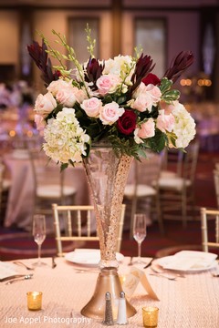Floral arrangement design for the table center pieces Floral arrangement design for the table center pieces