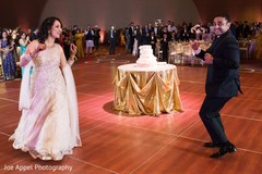 Indian newlyweds have a blast dancing during the reception Indian newlyweds have a blast dancing during the reception