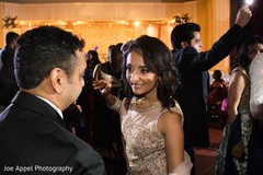 Beautiful maharani smiling with the Indian groom during the dance Beautiful maharani smiling with the Indian groom during the dance