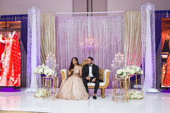 Indian bride and groom having cheers at wedding reception. Indian bride and groom having cheers at wedding reception.
