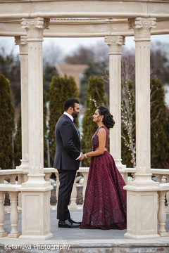 Amazing shot of the Indian couple holding hands outdoors Amazing shot of the Indian couple holding hands outdoors