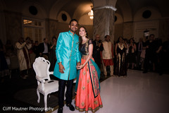 Indian groom and beautiful maharani posing for pictures at the venue Indian groom and beautiful maharani posing for pictures at the venue