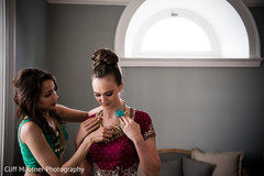 Indian bride getting ready with the beautiful sari Indian bride getting ready with the beautiful sari
