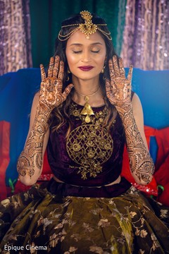 Indian bride showing mehndi art Indian bride showing mehndi art