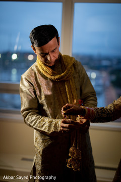 Maharani's father helps her to get ready for the ceremony Maharani's father helps her to get ready for the ceremony